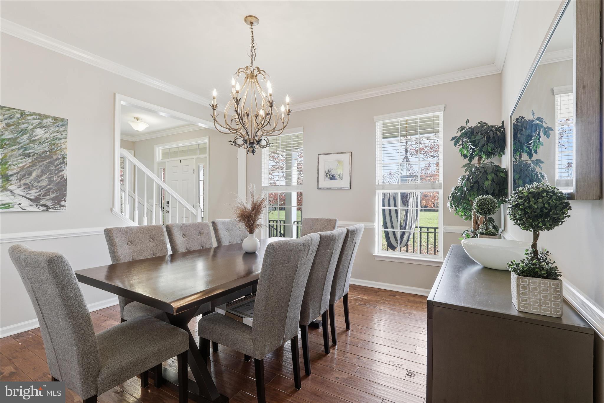 6711 Selbourne Lane Gainesville, VA 20155 - Photo 10 of 55 a view of a dining room with furniture window and outside view
