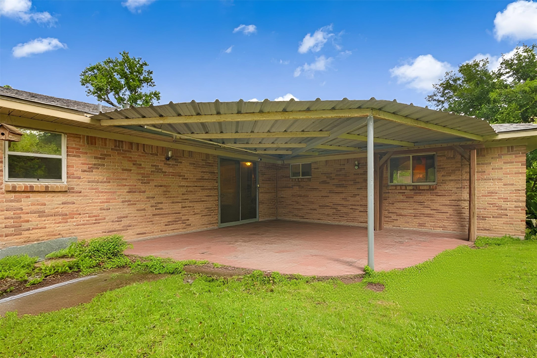 8406 East Mt Houston Road Houston, TX 77050 - Photo 21 of 30 a view of a house with a yard