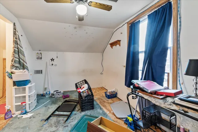 a room with furniture and a flat screen tv