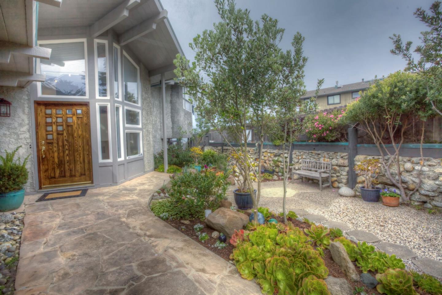193 Reef Point Road Moss Beach, CA 94038 - Photo 3 of 27 a view of a chair and table in the patio