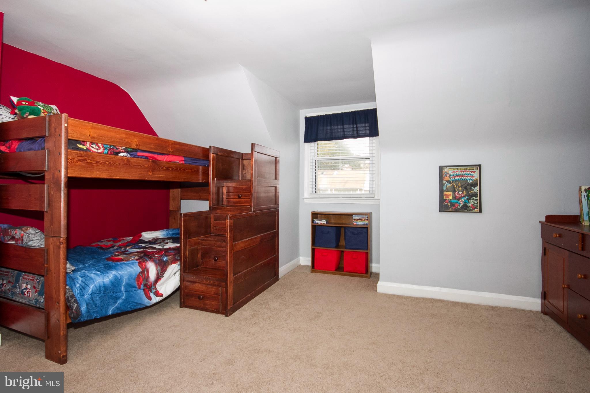 3631 Eitemiller Road Baltimore, MD 21244 - Photo 14 of 27 a bed room with a bed and furniture