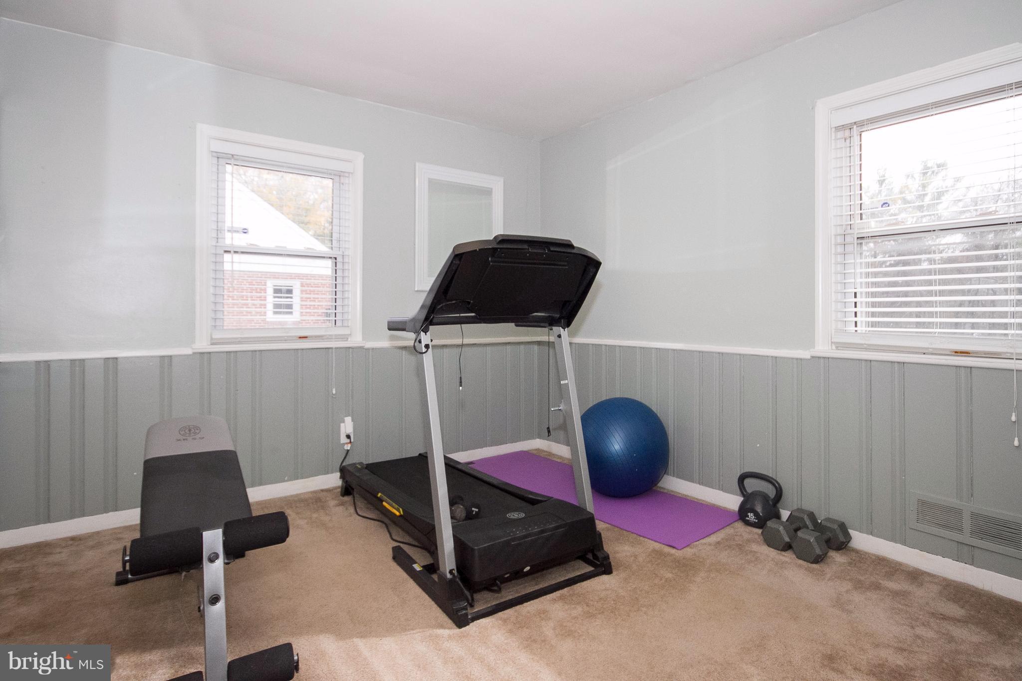 3631 Eitemiller Road Baltimore, MD 21244 - Photo 16 of 27 a room with a window and gym equipment