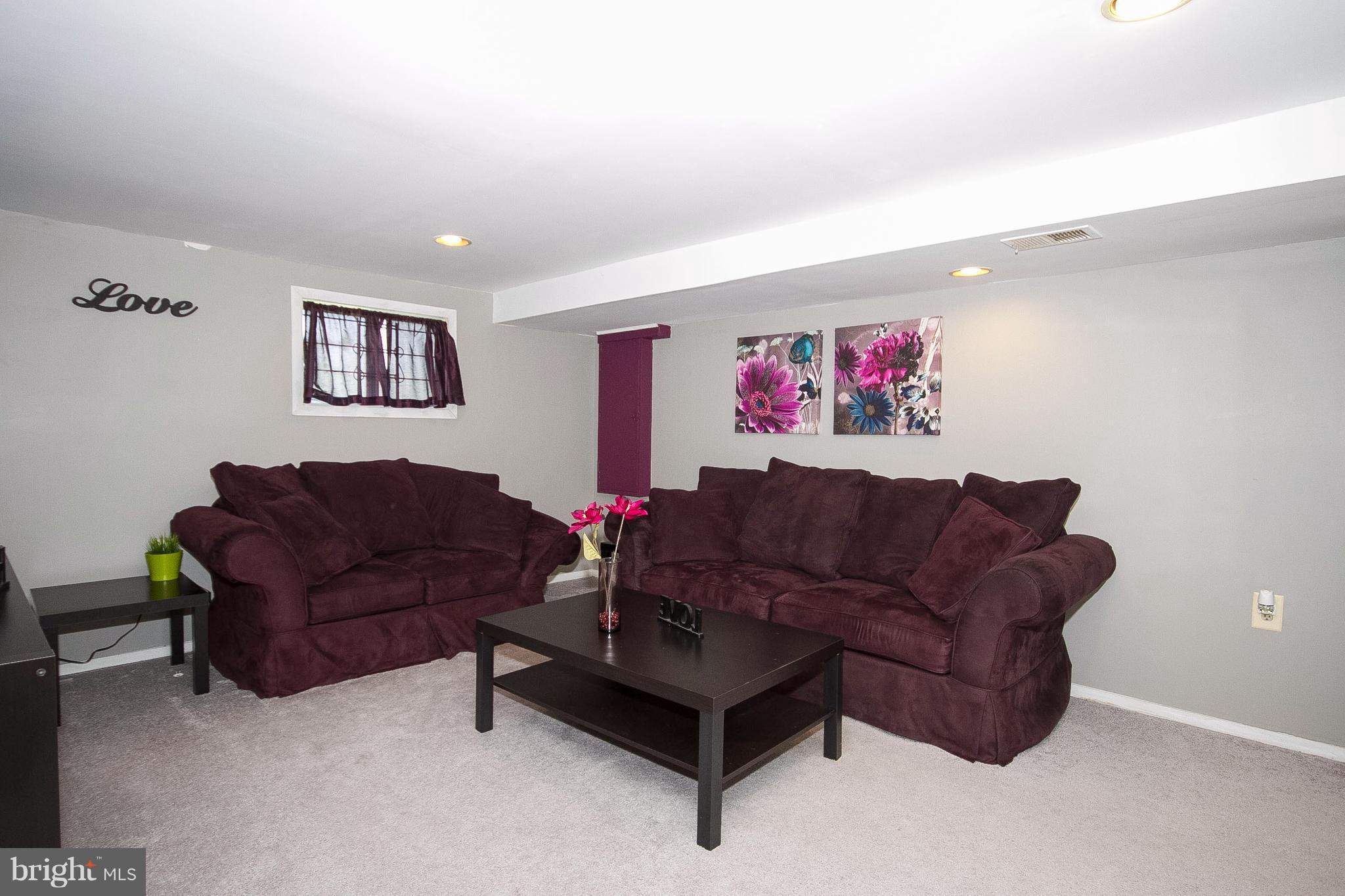 3631 Eitemiller Road Baltimore, MD 21244 - Photo 20 of 27 a living room with furniture and a couch