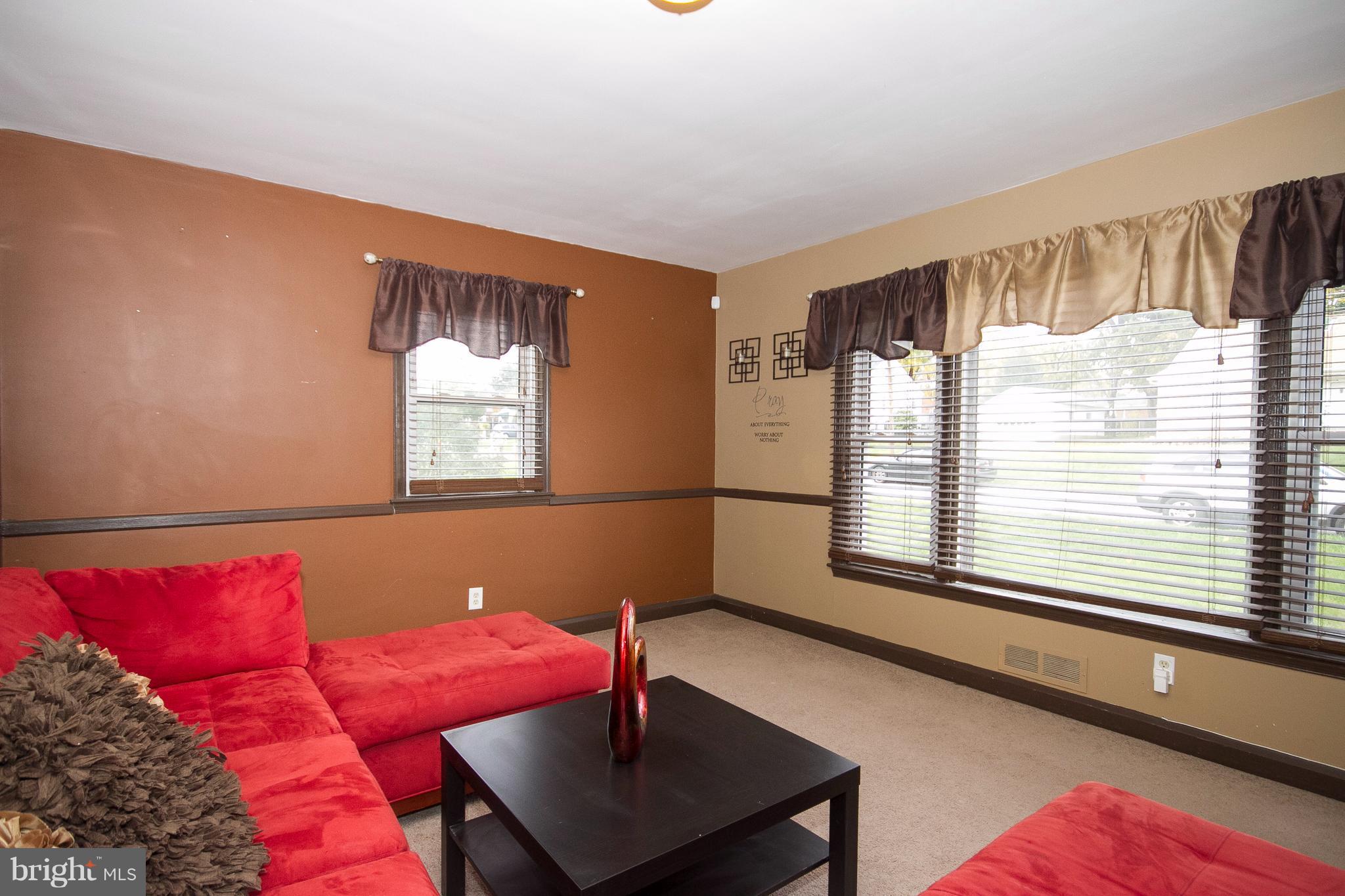 3631 Eitemiller Road Baltimore, MD 21244 - Photo 4 of 27 a living room with furniture and a window