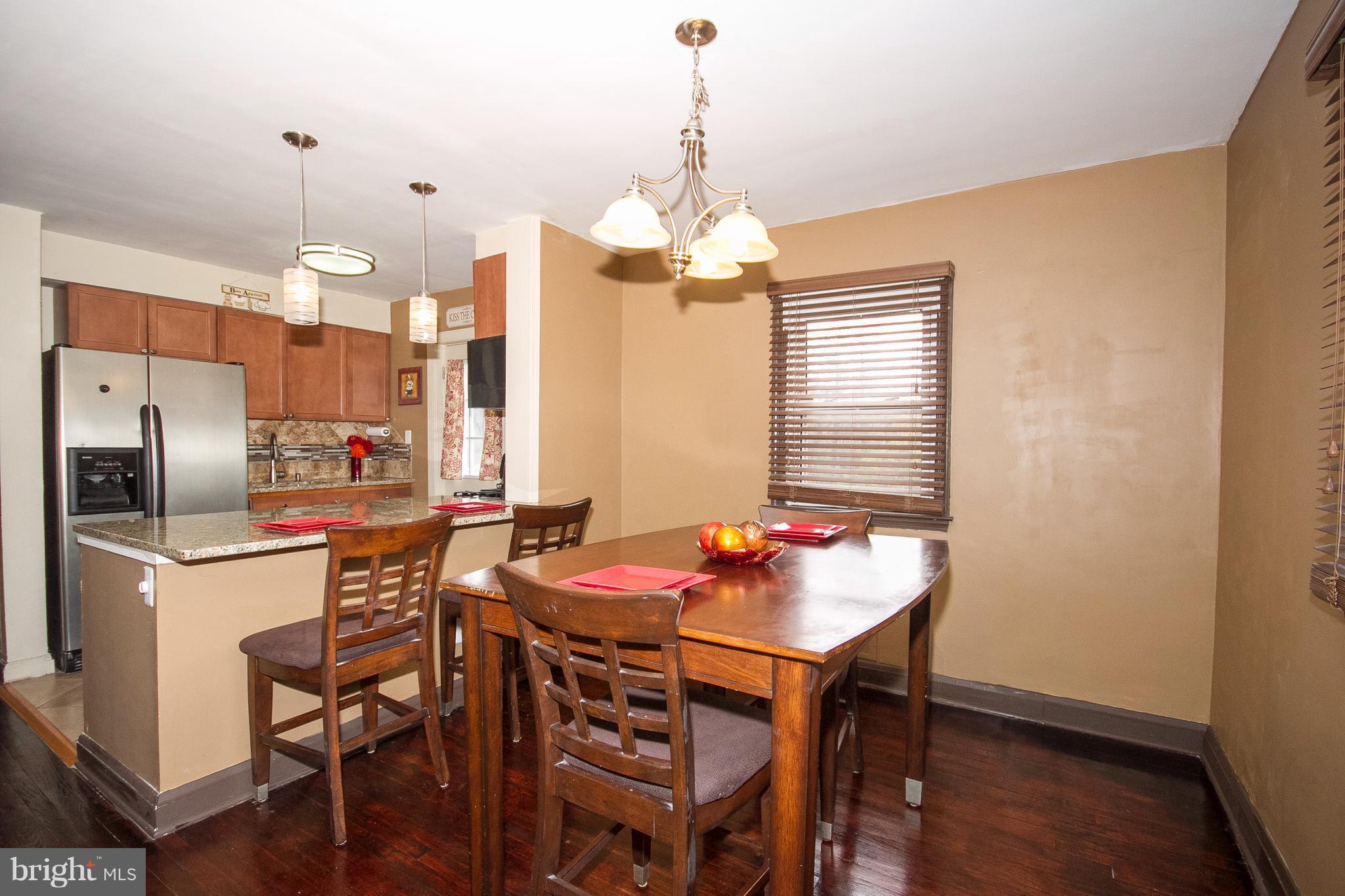 3631 Eitemiller Road Baltimore, MD 21244 - Photo 10 of 27 a dining room with furniture and window