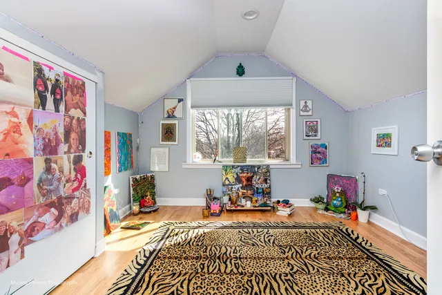 a bed room with a bed and a window