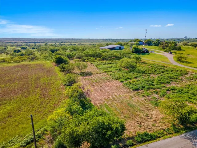 a view of a lake with a city