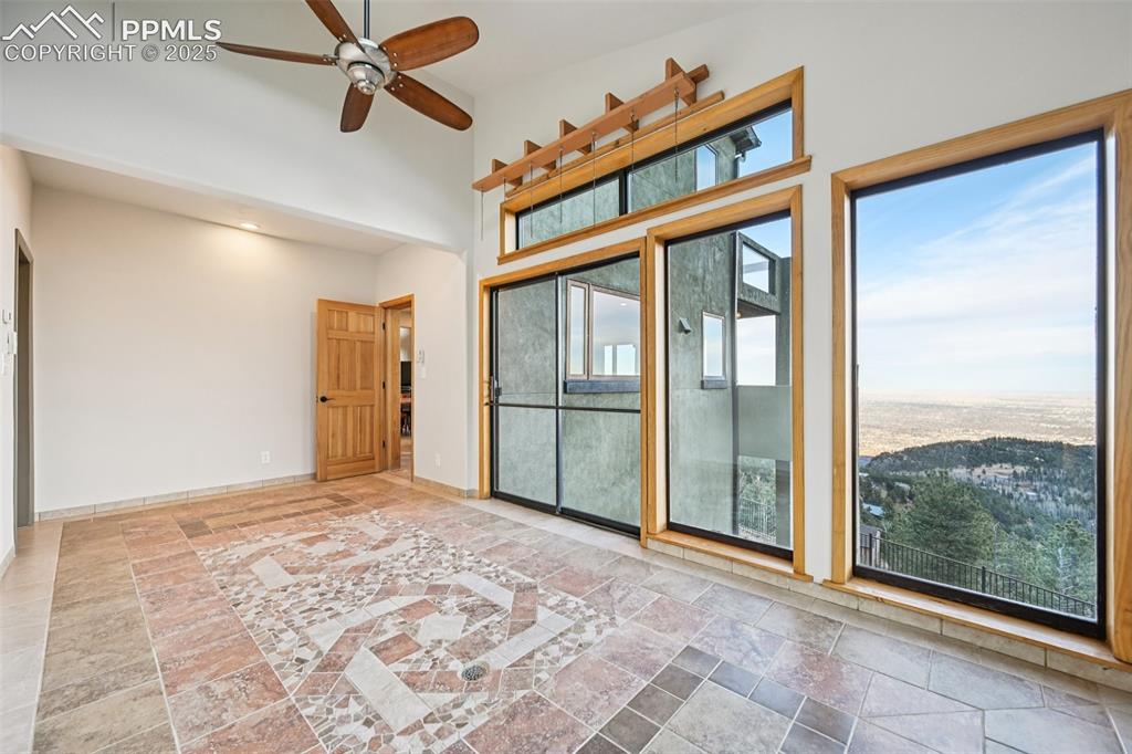 1417 Forest Road Manitou Springs, CO 80829 - Photo 19 of 50 a view of an empty room with a window