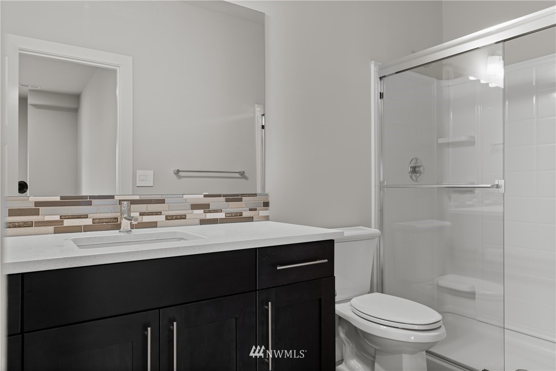 1215 198th Place Southeast Bothell, WA 98012 - Photo 33 of 40 a bathroom with a sink and a toilet