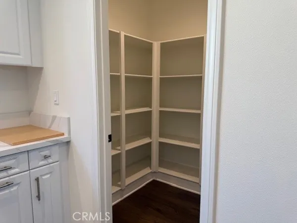 a view of a big room with wooden floors