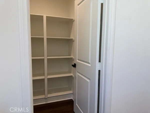 a kitchen with a sink stove and refrigerator