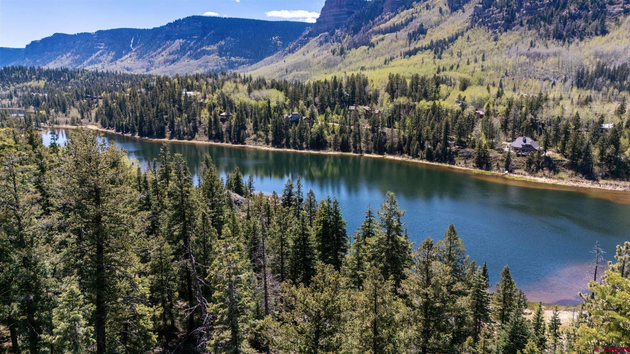 361 Deer Run Way Durango, CO 81301 - Photo 7 of 29 a view of a lake with a mountain in the background