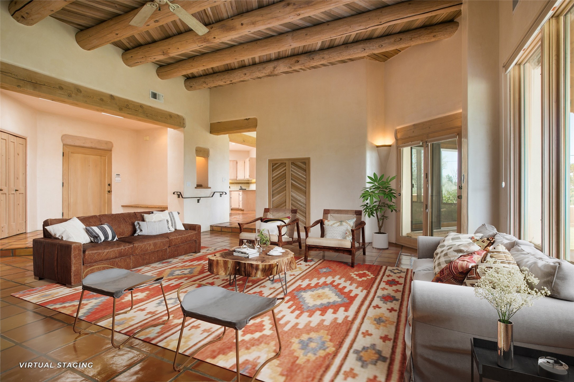 Saltillo tile, vigas and latillas adorn this living room with virtual furniture
