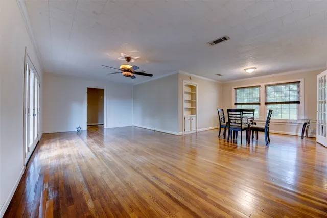 a view of a livingroom with furniture and wooden floor