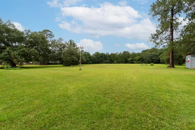 a view of a backyard with a barn house