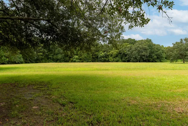 a view of a city with a lake