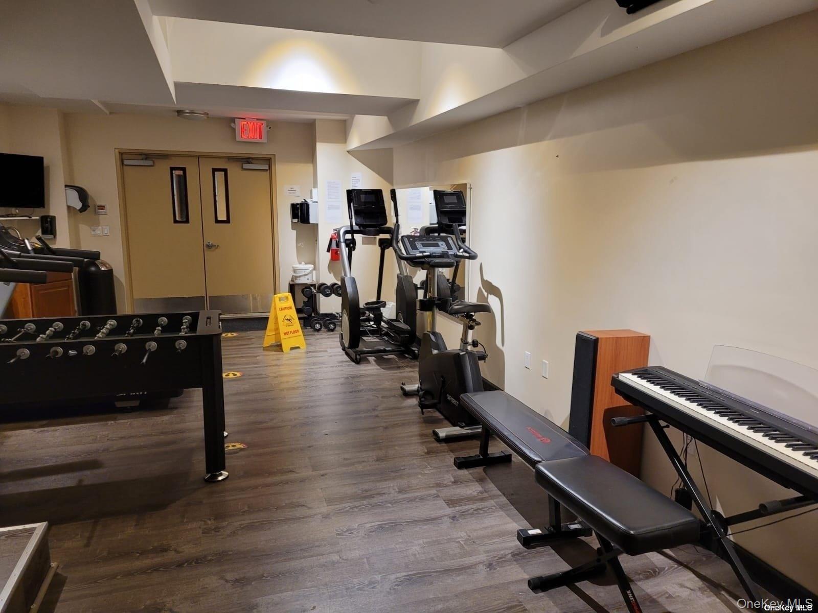 118-17 Union Turnpike, Unit 14E Queens, NY 11375 - Photo 20 of 24 a view of a room with gym equipment