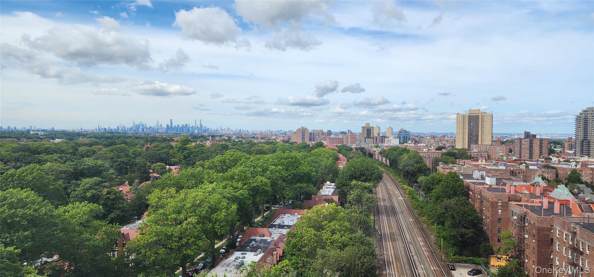 118-17 Union Turnpike, Unit 14E Queens, NY 11375 - Photo 23 of 24 a view of a city with lot of buildings