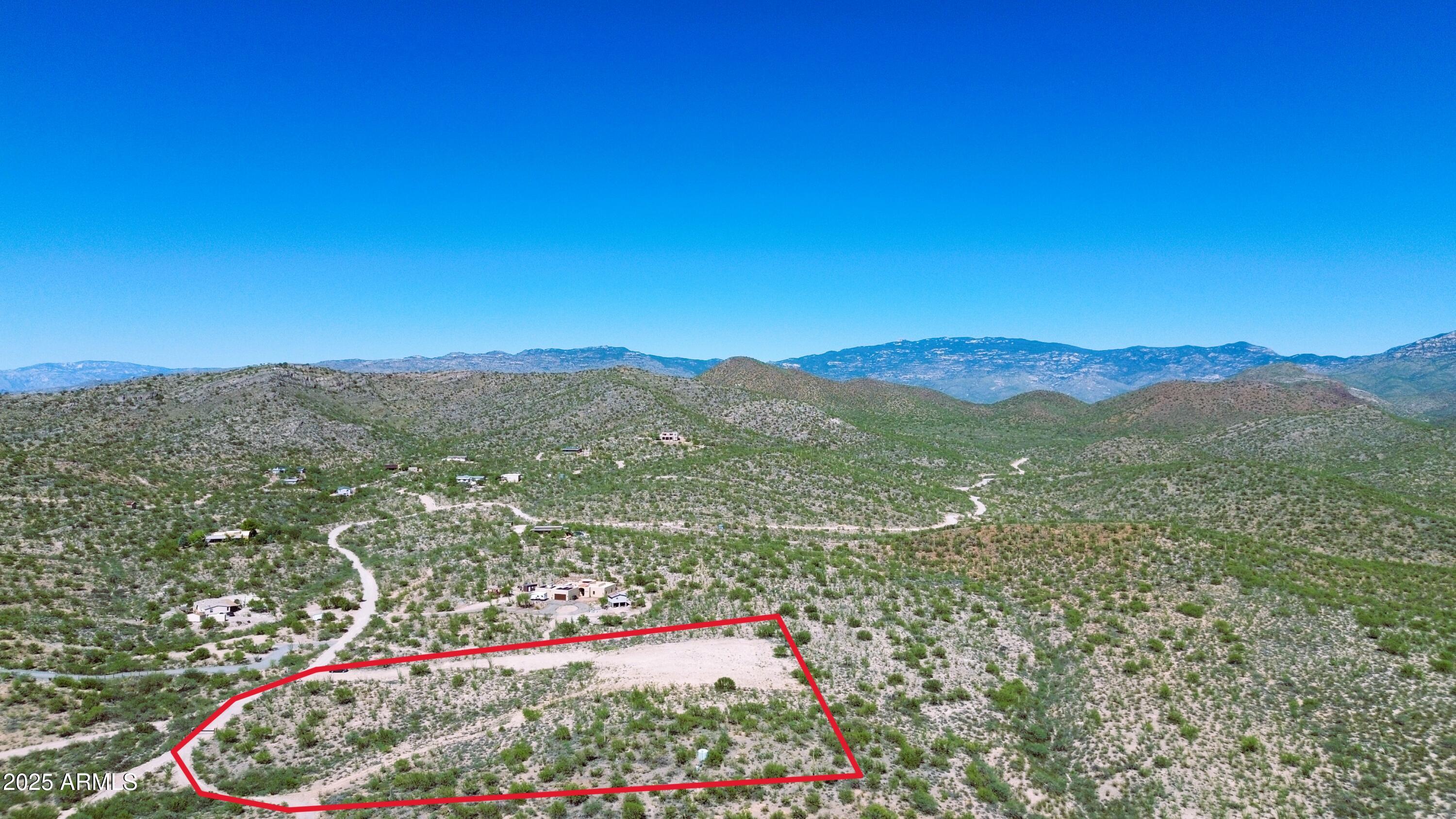 4-acres East Colossal Cave Road Vail, AZ 85641 - Photo 3 of 17 a view of a city with mountain