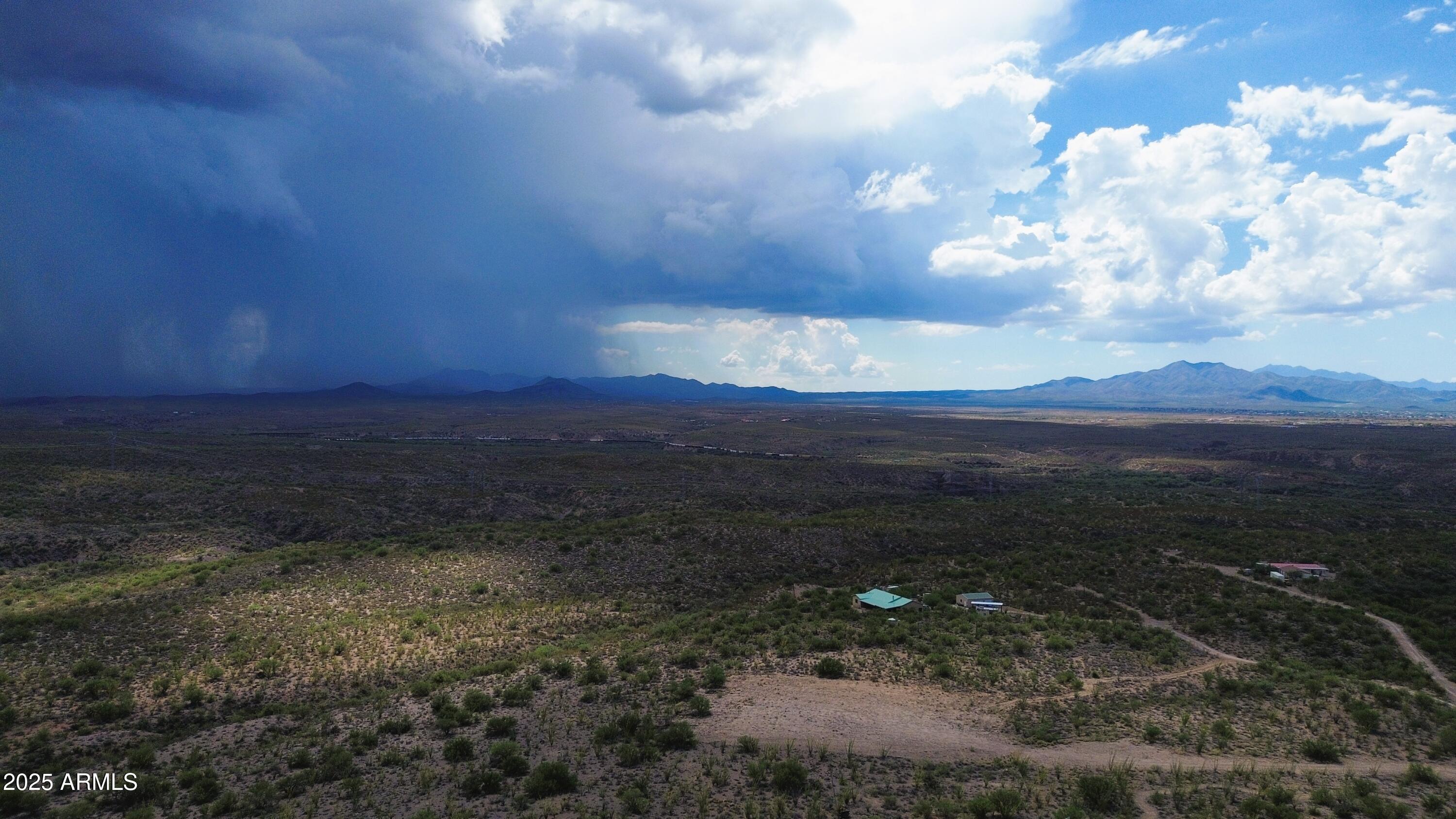 4-acres East Colossal Cave Road Vail, AZ 85641 - Photo 8 of 17 a view of a yard and sunset