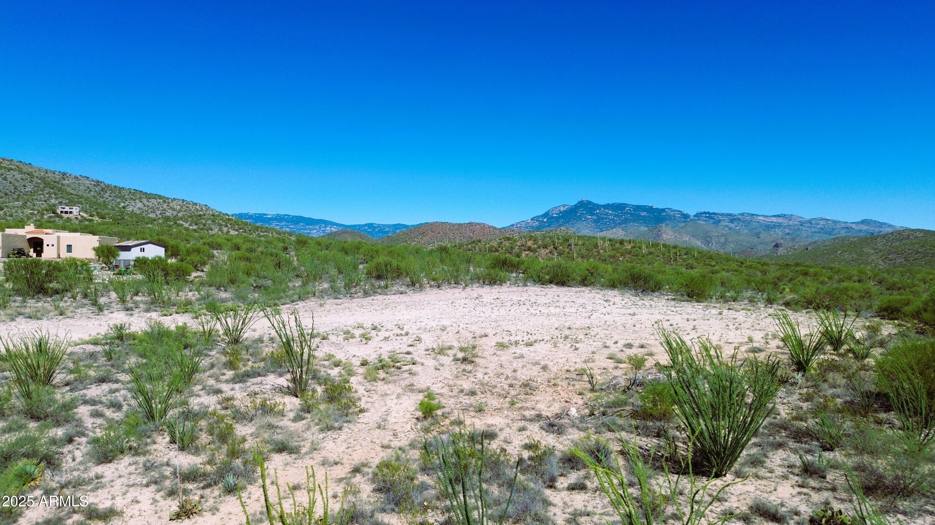 4-acres East Colossal Cave Road Vail, AZ 85641 - Photo 9 of 17 a view of lake with mountain