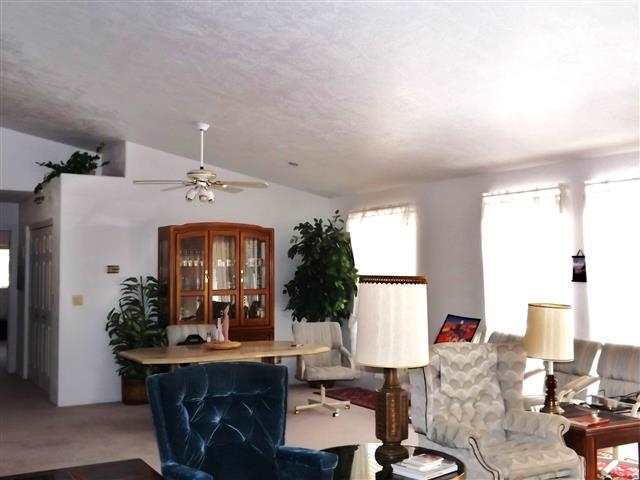 2097 Chevelon Road Overgaard, AZ 85933 - Photo 18 of 35 a view of a living room and dining room