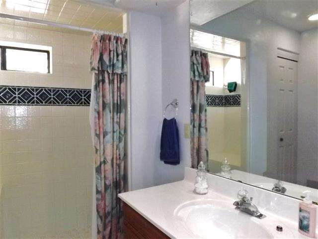 2097 Chevelon Road Overgaard, AZ 85933 - Photo 27 of 35 a bathroom with a sink and a mirror