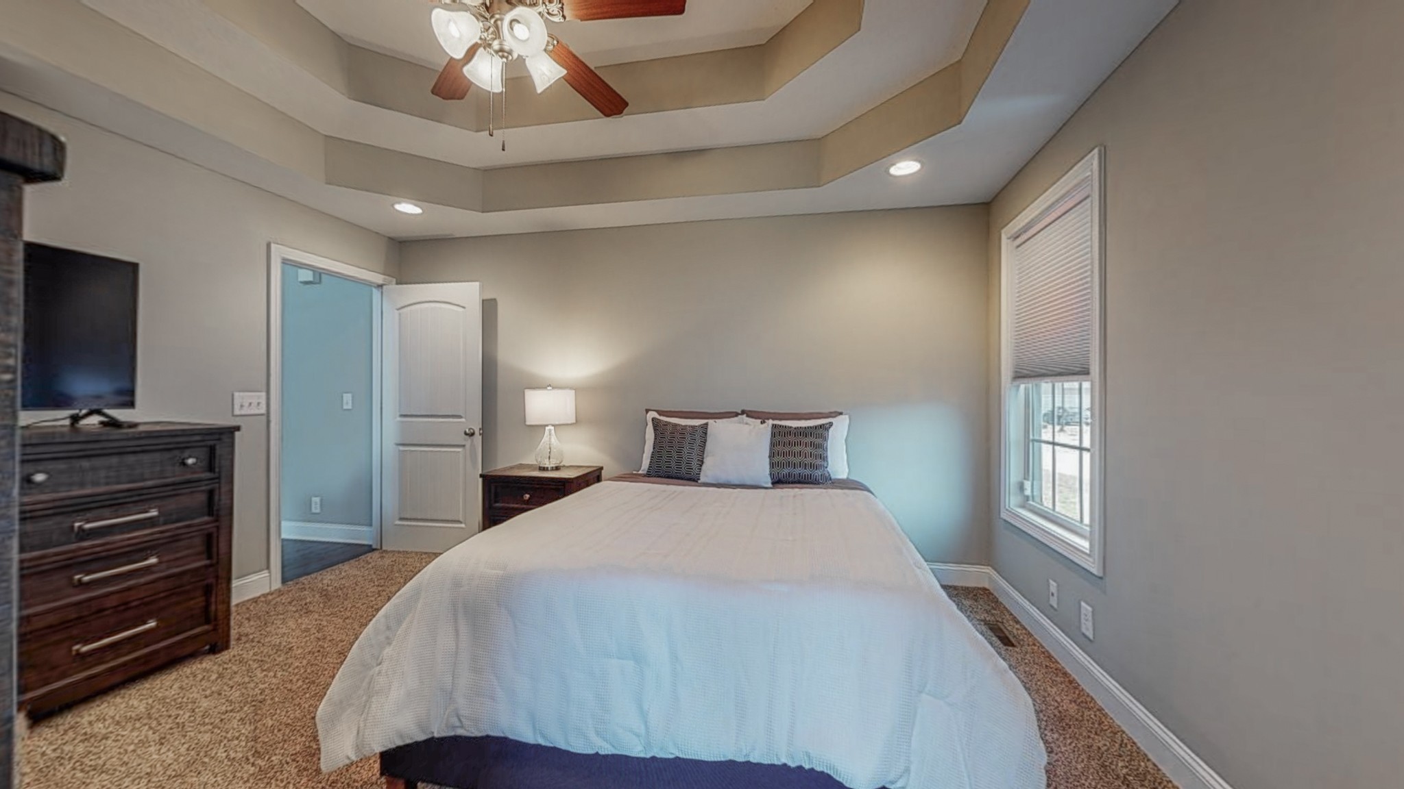 3788 Suiter Road Clarksville, TN 37040 - Photo 18 of 35 a bedroom with a bed and a flat screen tv