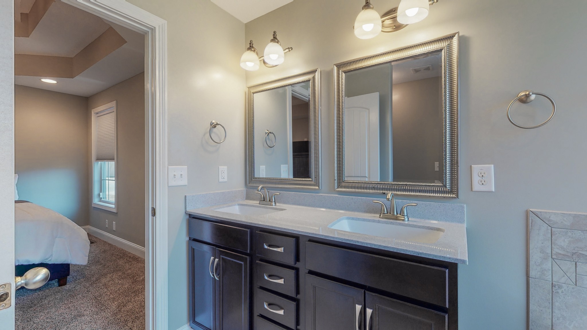 3788 Suiter Road Clarksville, TN 37040 - Photo 20 of 35 a bathroom with a sink double vanity and a mirror