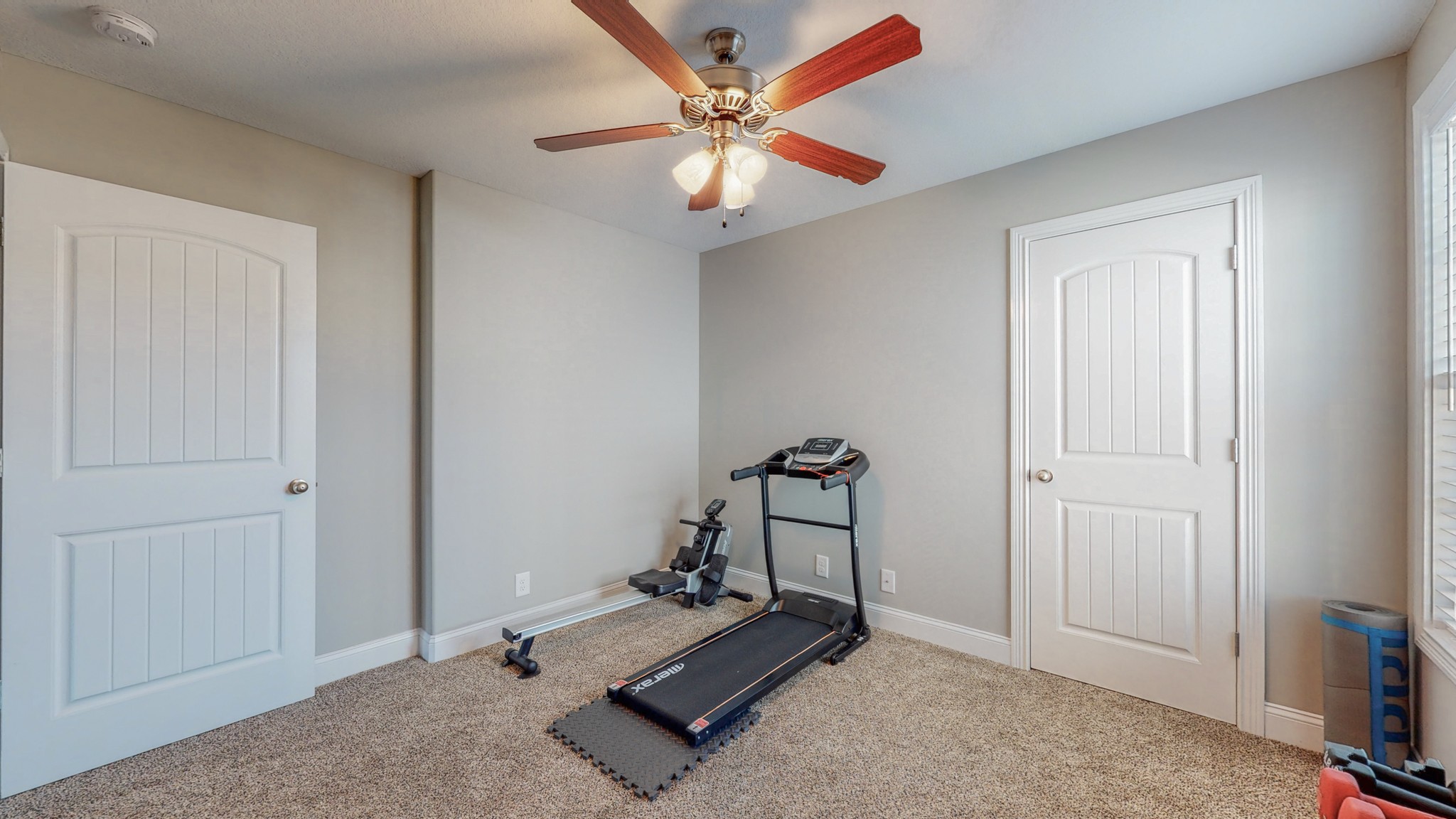 3788 Suiter Road Clarksville, TN 37040 - Photo 25 of 35 a room with chandelier fan and windows