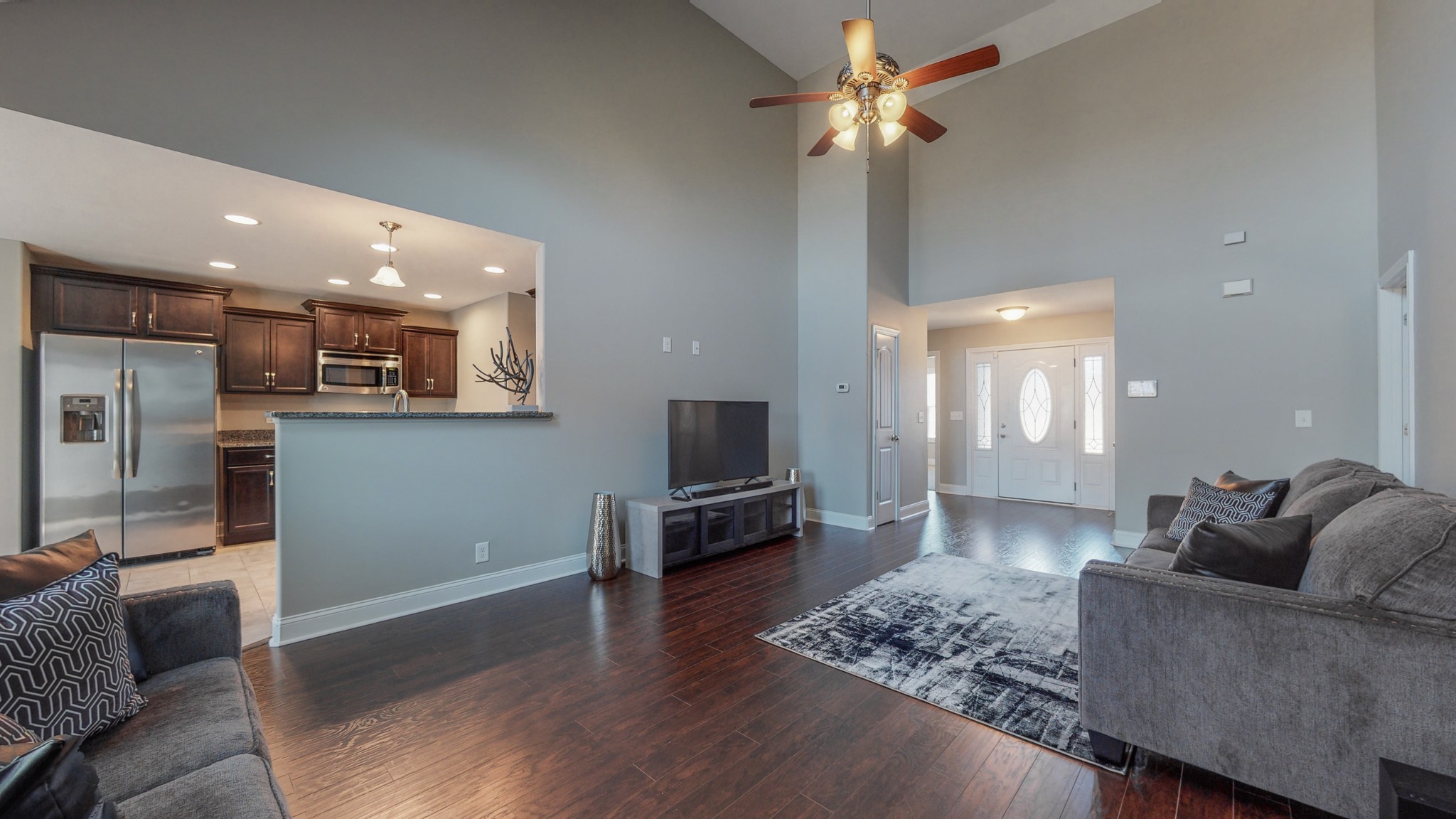 3788 Suiter Road Clarksville, TN 37040 - Photo 6 of 35 a living room with furniture and a wooden floor
