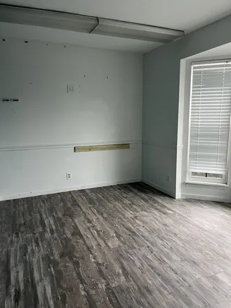 a view of a room with an empty space