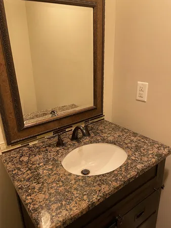 a bathroom with a toilet and a sink