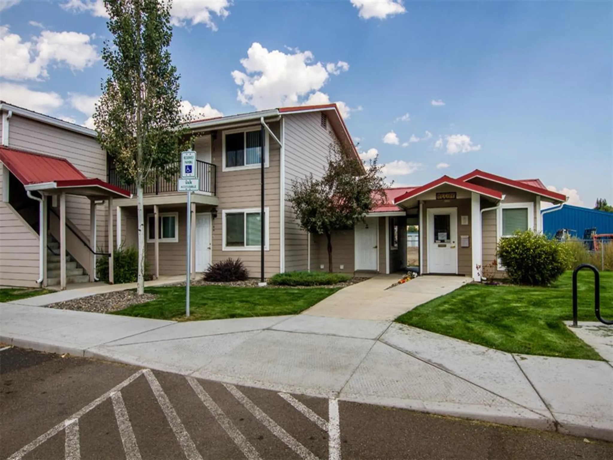 607 Southwest 2nd Street Enterprise, OR 97828 - Photo 2 of 9 a front view of a house with a yard and garage