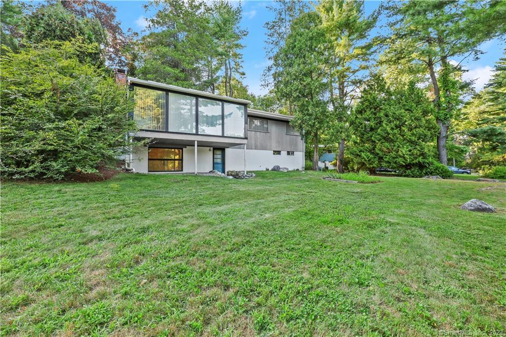 a house view with a garden space