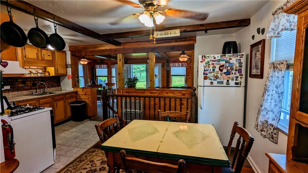 540 Old Farm Road Pittsburgh, PA 15234 - Photo 4 of 10 a view of a dining room with furniture window and outside view