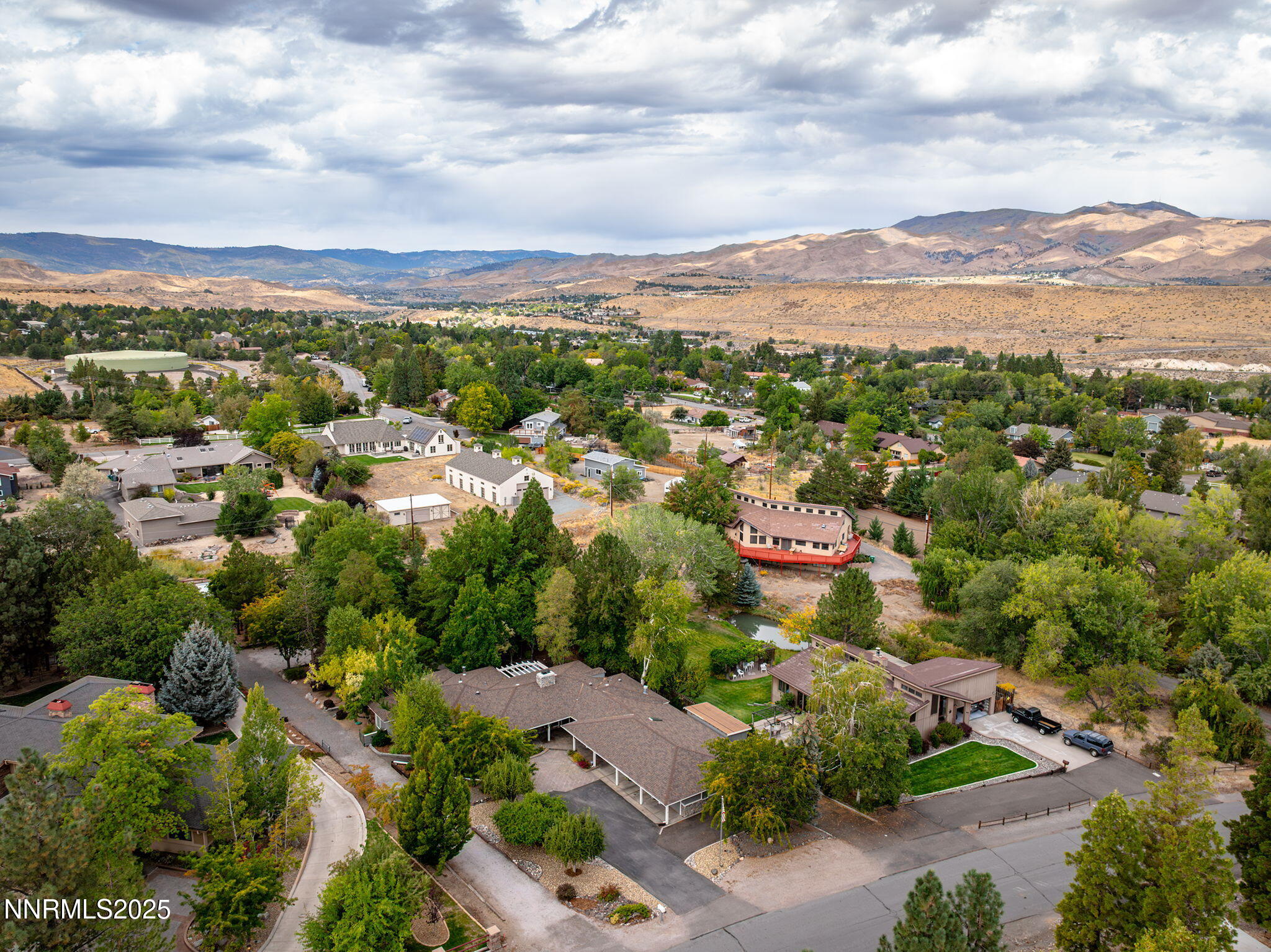 4265 Hackamore Drive Reno, NV 89519 - Photo 54 of 66 an aerial view of residential houses with outdoor space and street view
