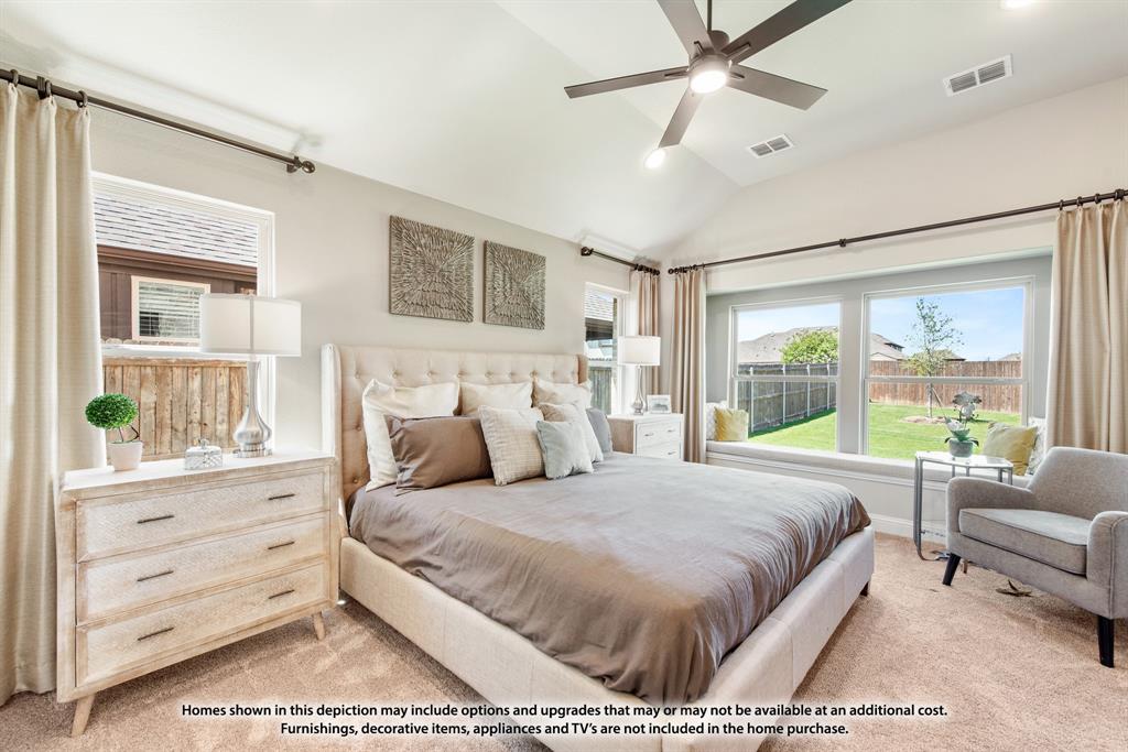 1106 Cardinal Drive Midlothian, TX 76065 - Photo 18 of 36 a bedroom with a large bed and a window