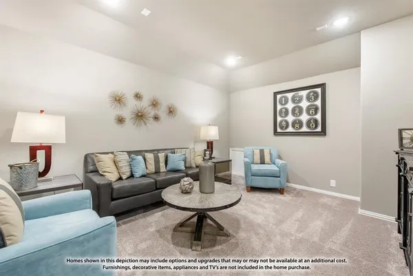 a living room with furniture and a rug