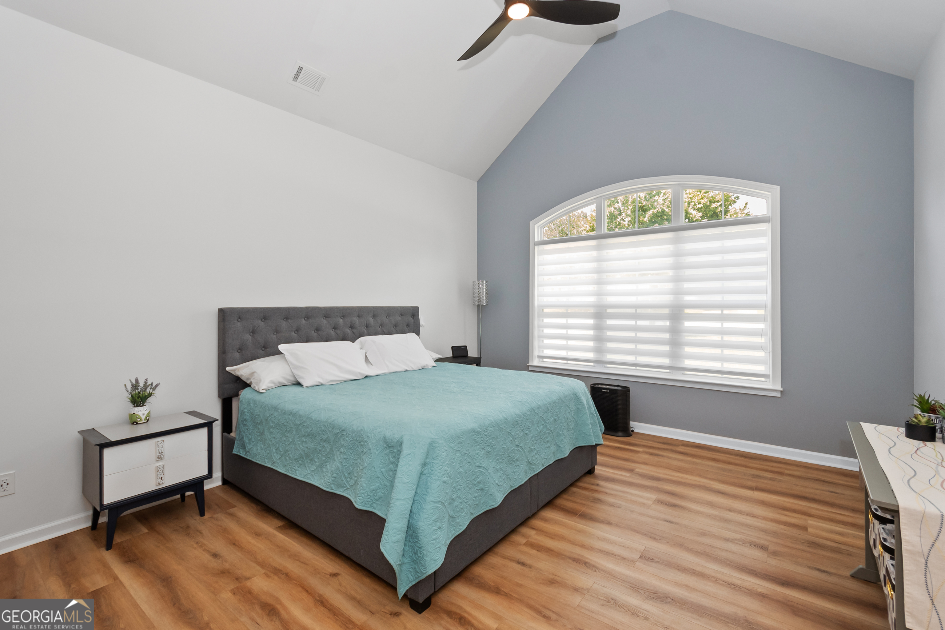 71 Thomaston Street Newnan, GA 30263 - Photo 19 of 38 a bedroom with a bed and a window