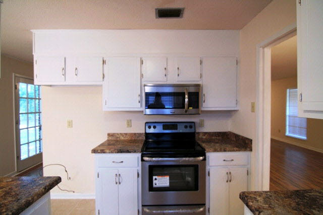 3384 Lacoste Road Mobile, AL 36618 - Photo 12 of 21 Kitchen 11 x 8. Brand new flat top range, Dishwasher, and Microwave will remain.