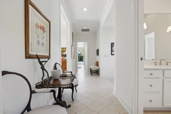 a view of a livingroom with furniture and a bathroom