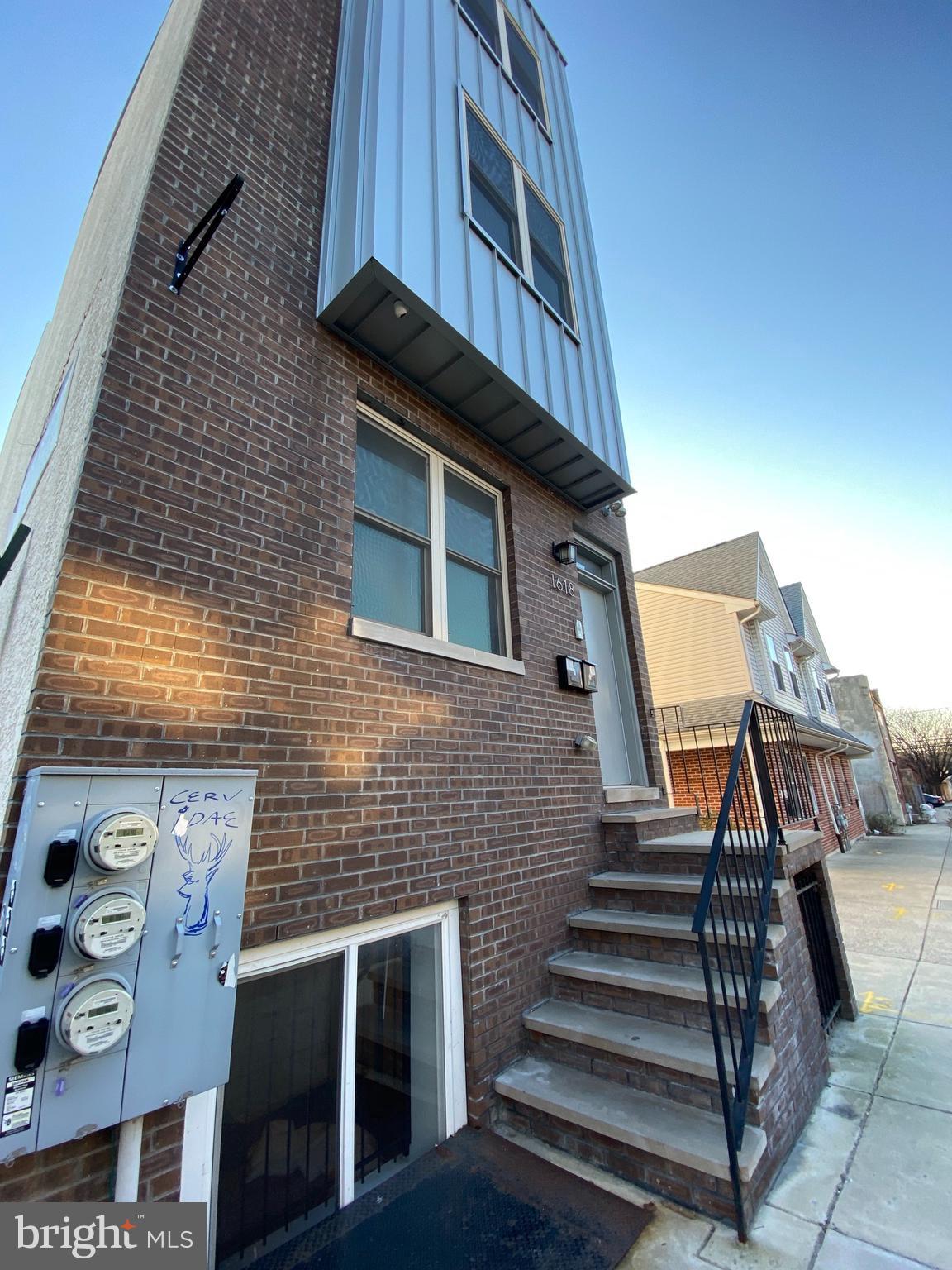 a view of a house with stairs and stairs