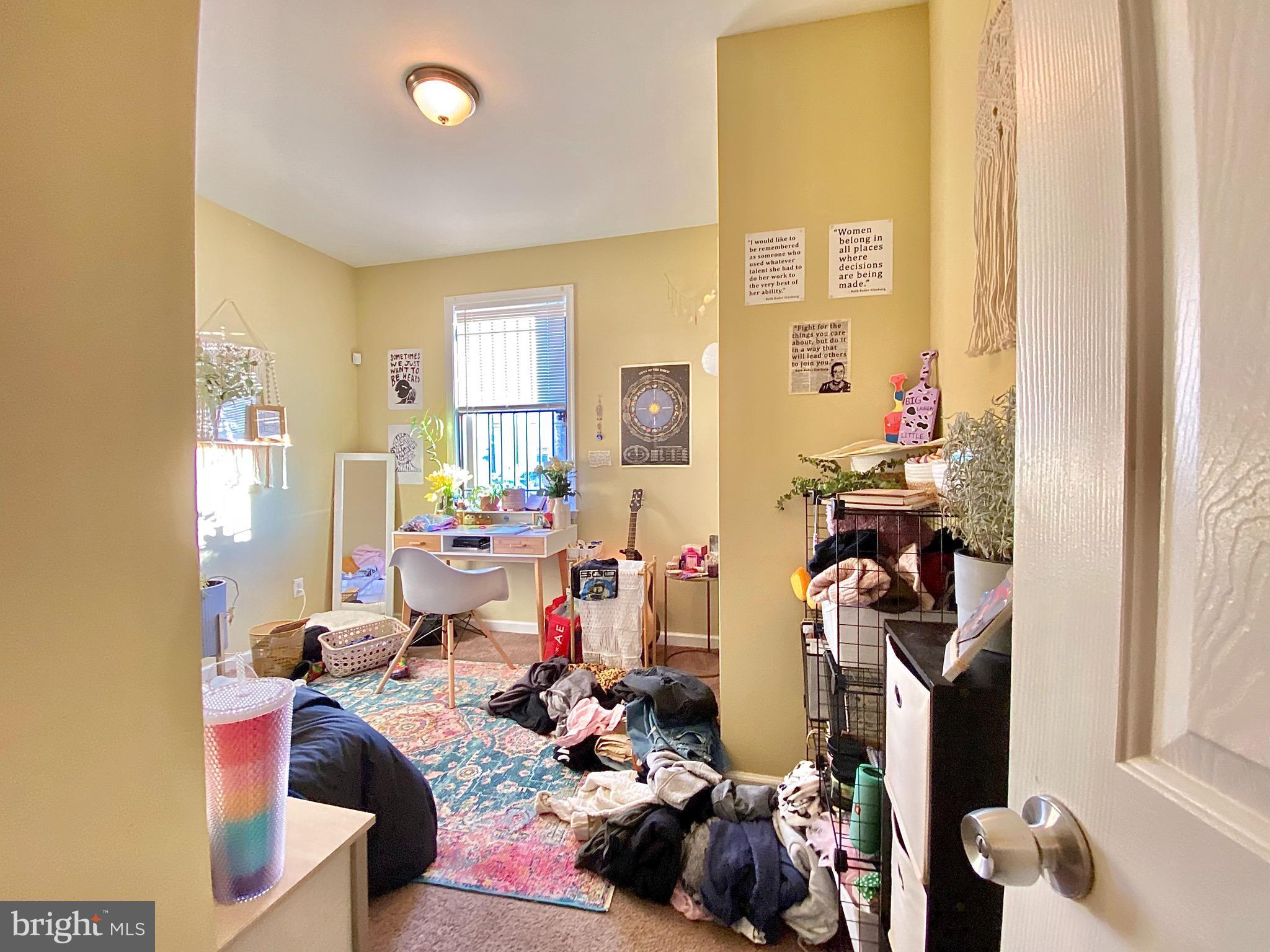 1618 Page Street, Unit B Philadelphia, PA 19121 - Photo 7 of 17 a view of a workspace with furniture and a window