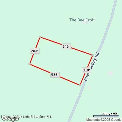 a backyard of a house with a garden