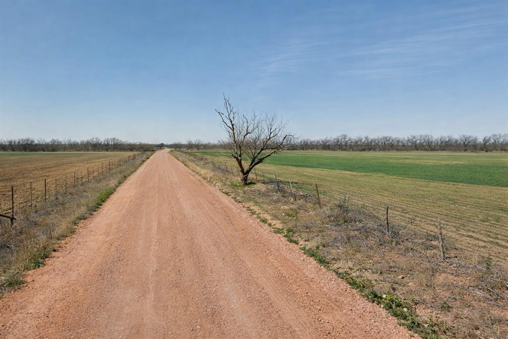 R24052 Kimbrough Road Haskell, TX 79521 - Photo 3 of 3 a view of a lake with a big yard