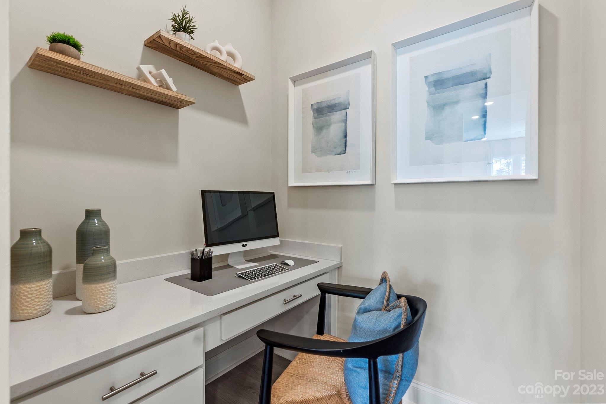 8958 Morning Mist Road Harrisburg, NC 28215 - Photo 16 of 28 a view of a workspace with furniture