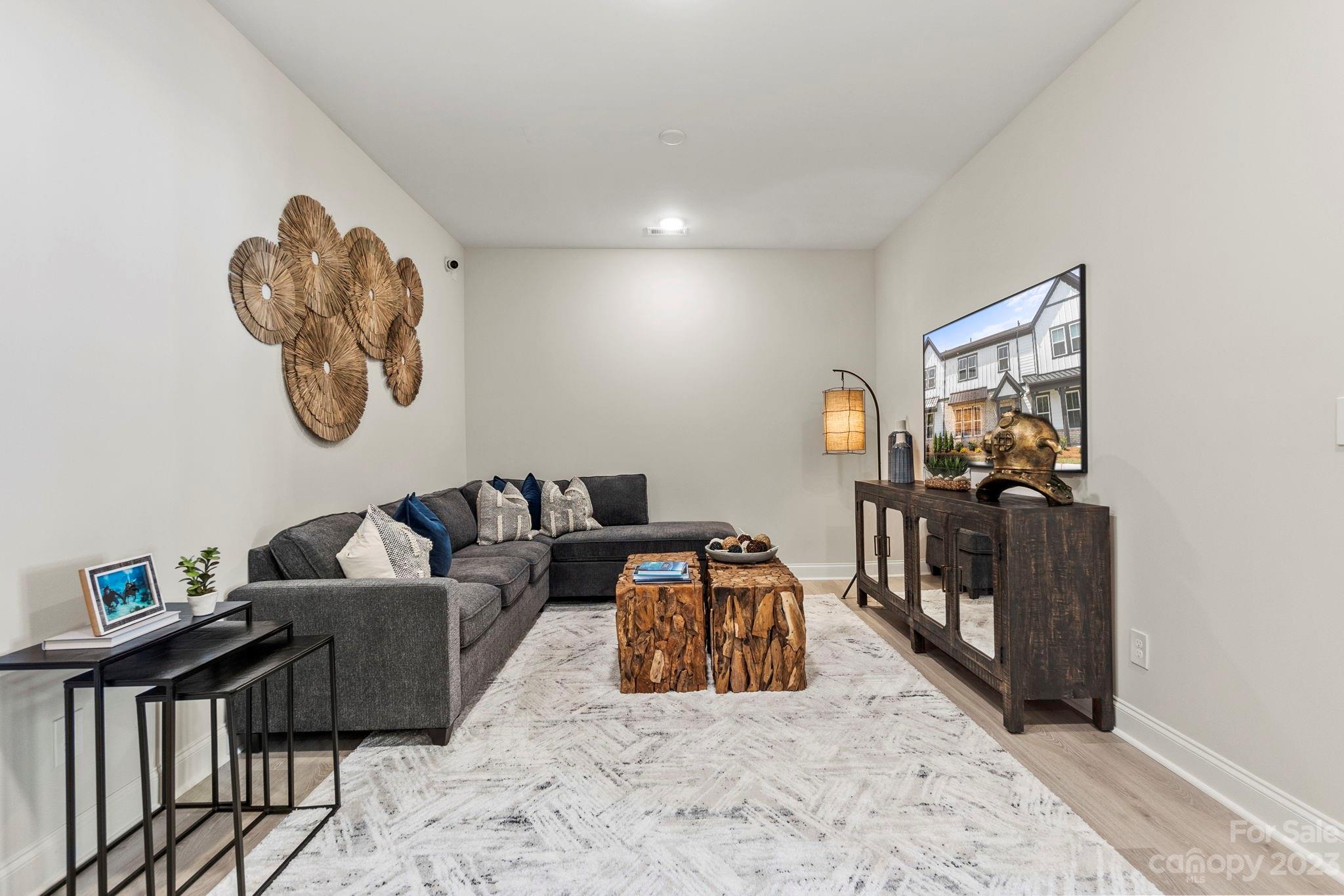 8958 Morning Mist Road Harrisburg, NC 28215 - Photo 19 of 28 a living room with furniture