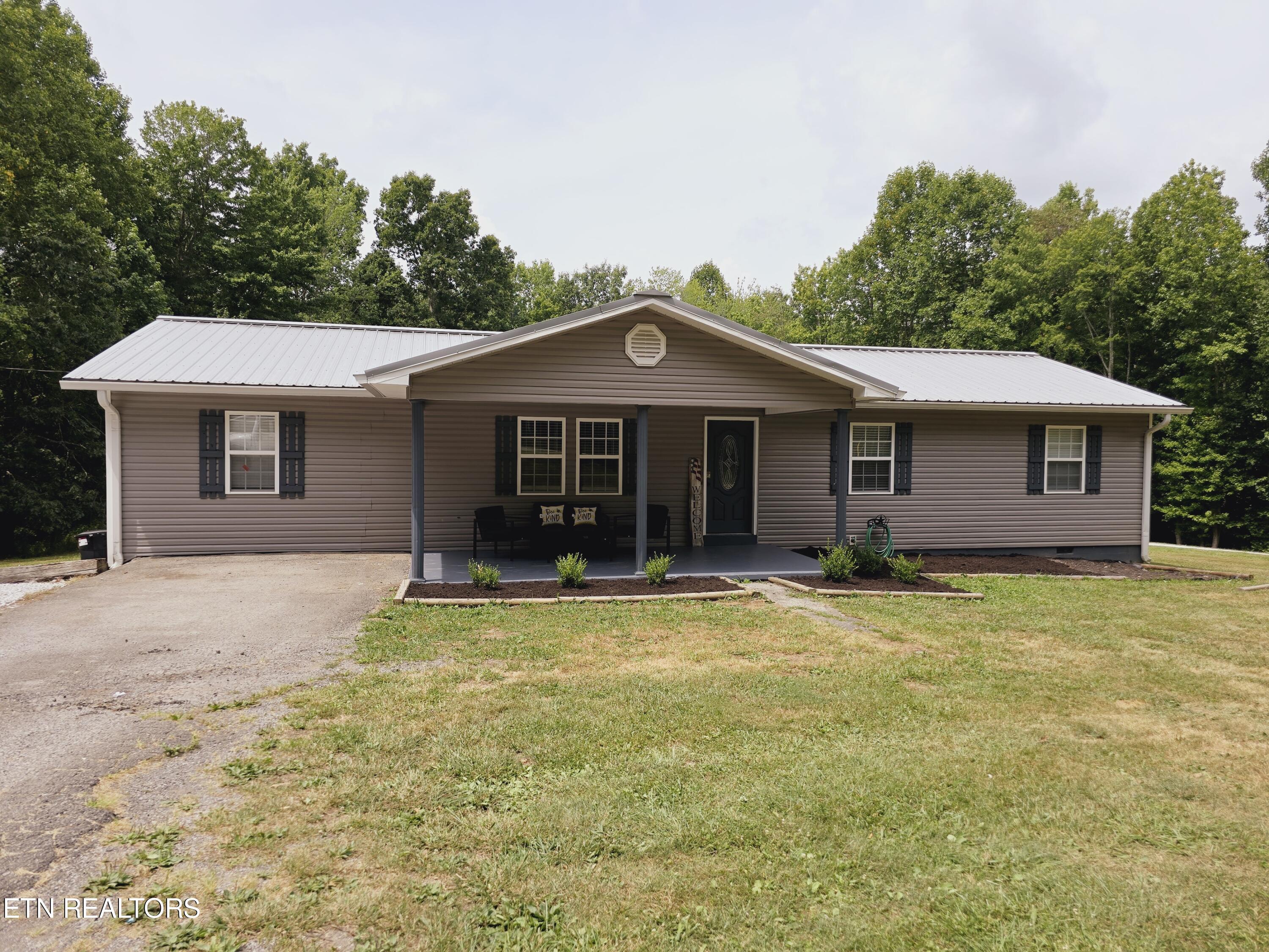 898 Phillips Loop Road Helenwood, TN 37755 - Photo 1 of 42 20240716_122505