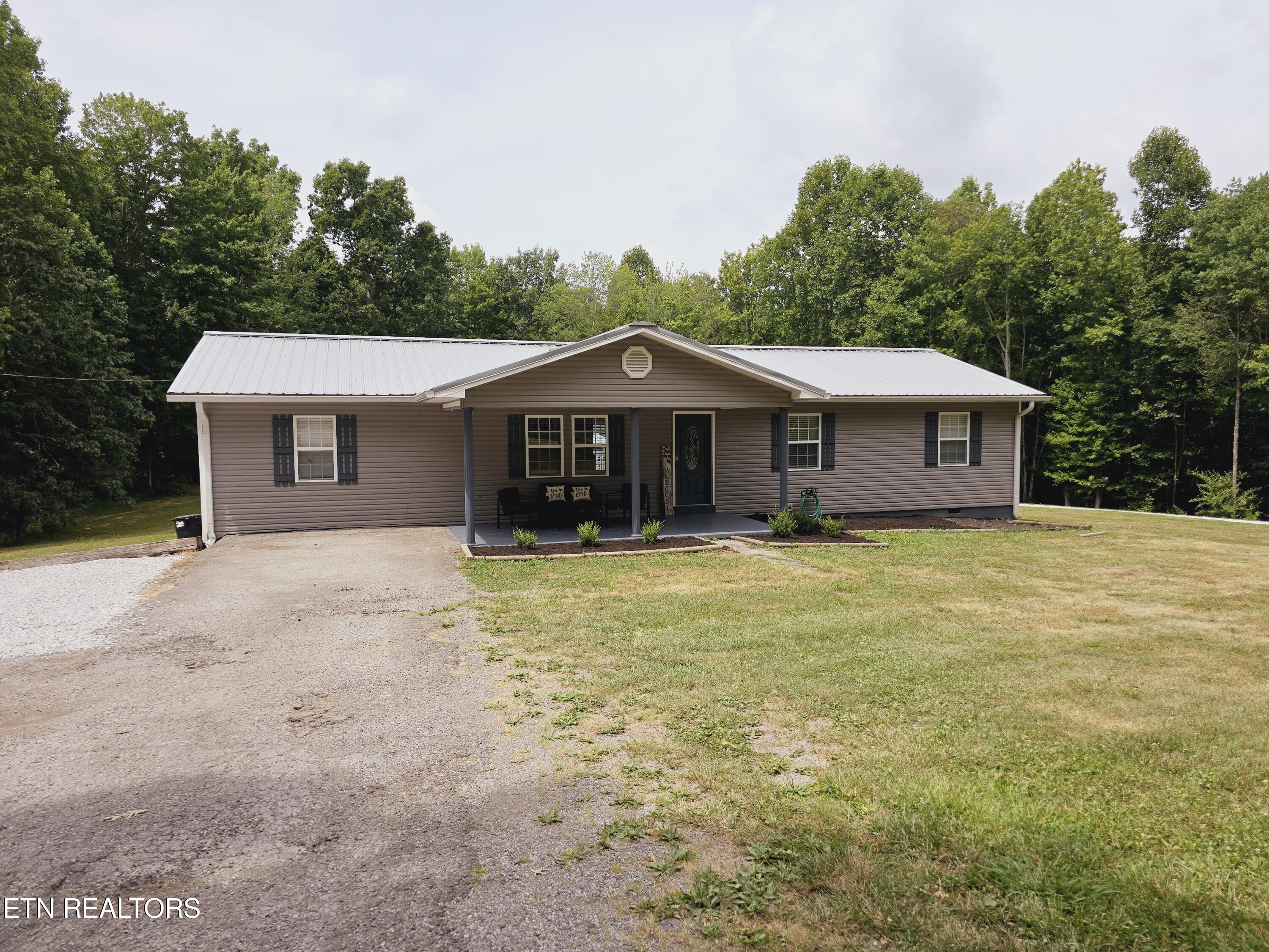898 Phillips Loop Road Helenwood, TN 37755 - Photo 3 of 42 20240716_122428